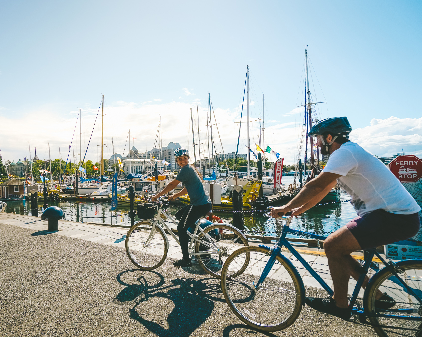 A couple bikes through the Inner Harbour in Victoria, BC
